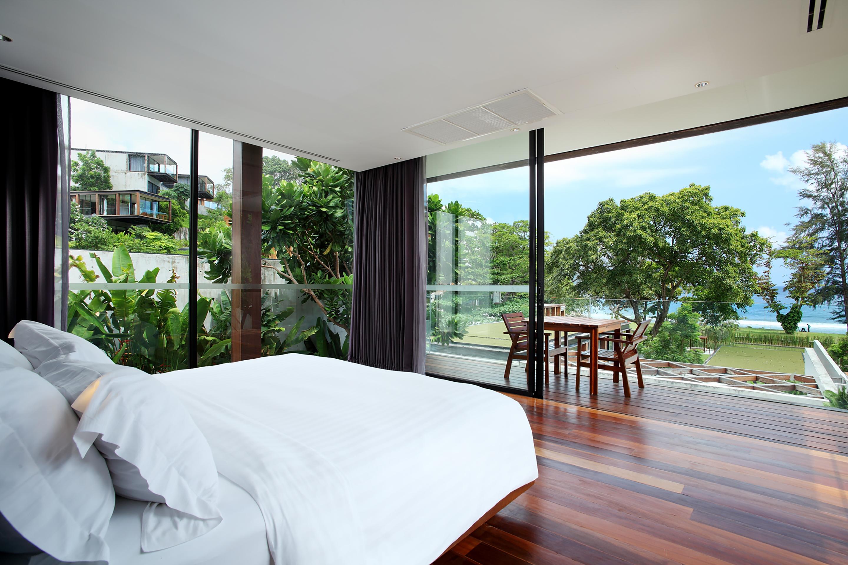 The Naka Phuket, A Member Of Design Hotels Kamala Beach Exterior foto A bedroom at the resort